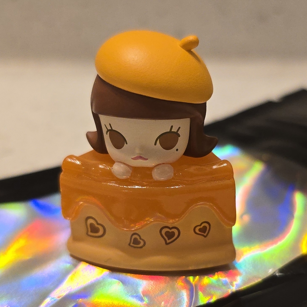 Cute Orange Figurine with Hearts